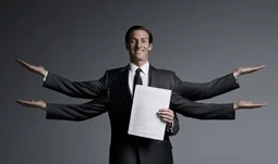 A banker with four arms holding a CV 