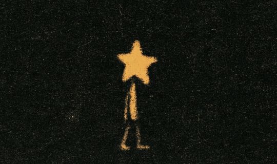a man with a star for a head walking away 