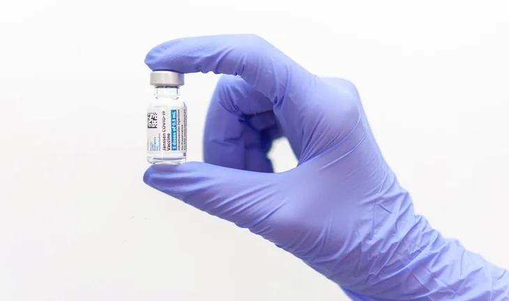 Do you need the COVID vaccine to work for a bank in London?