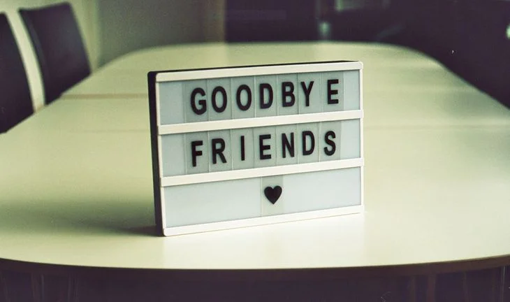 A sign that says goodbye friends