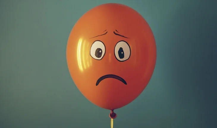 a balloon with a scared face