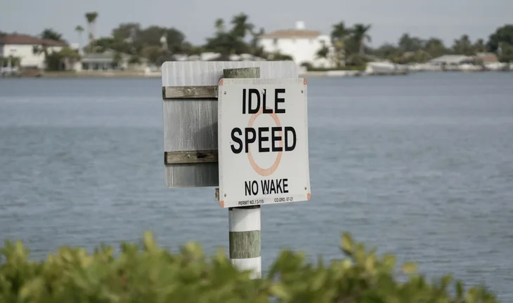  a sign that says 'Idle Speed'