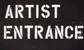 A sign that says artist entrance