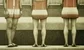 some people showing their legs in red and white bathing costumes