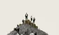 commodities traders standing on a pile of barrels